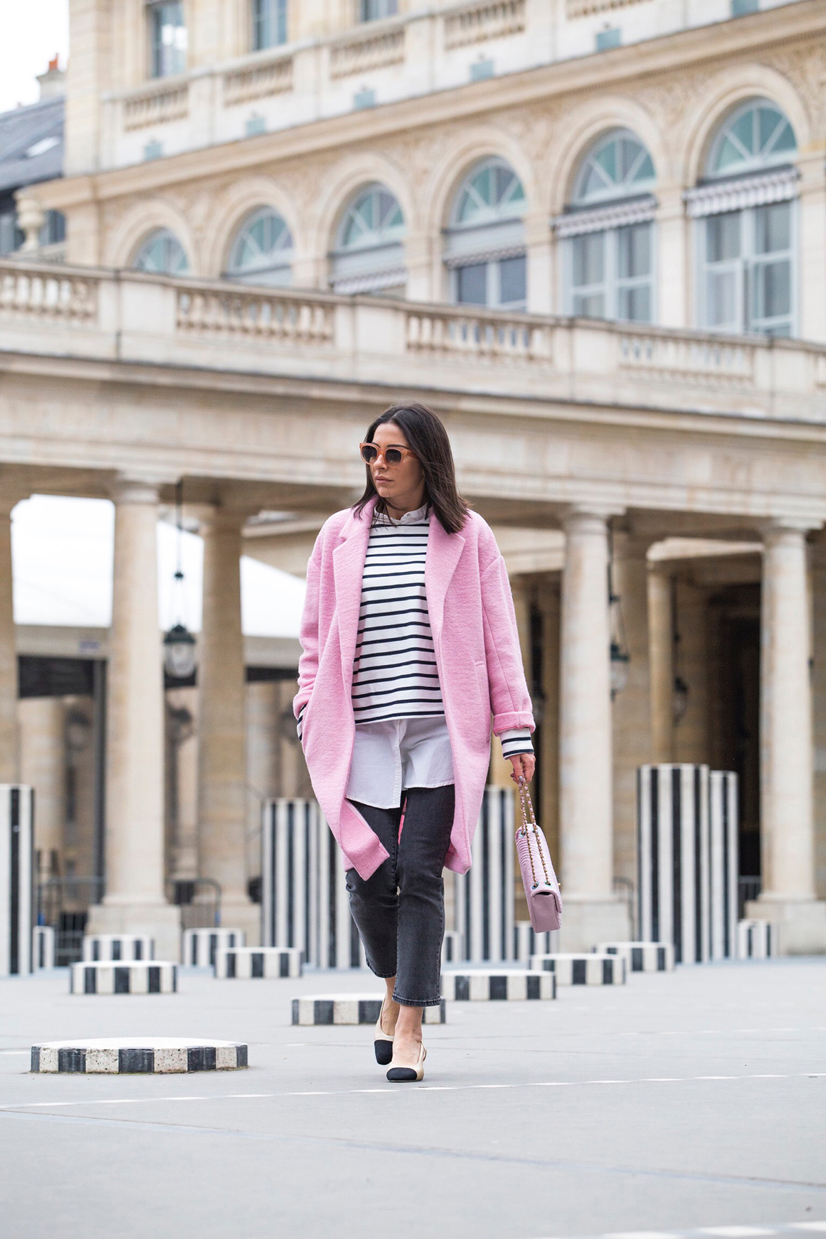 Stella Asteria Fashion & Lifestyle Blogger wearing pink Chanel bag and pink coat at Palais Royal