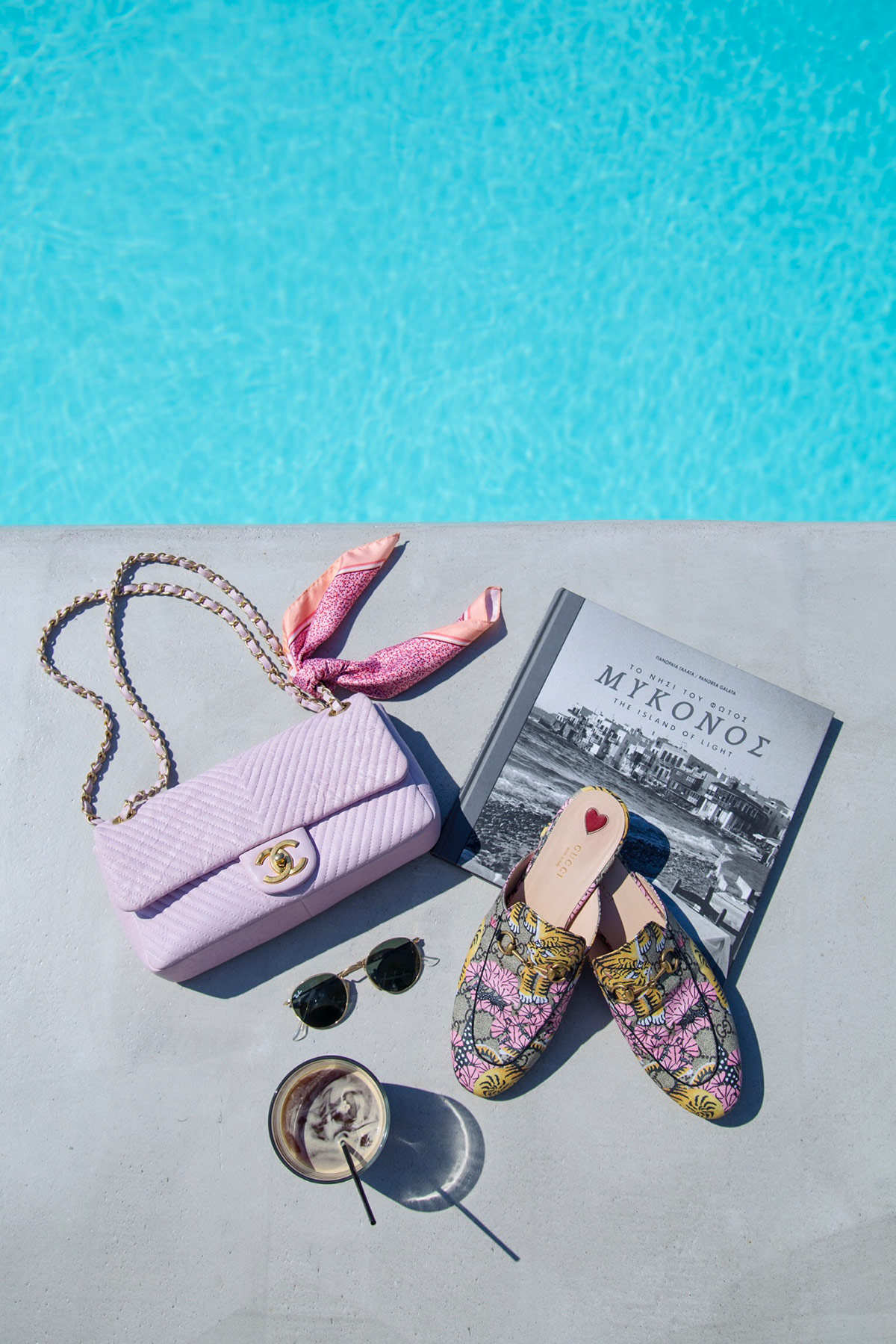 Chanel pink chevron leather bag, Gucci Princetown Bengal Slippers and Ray-Ban Round Sunglasses