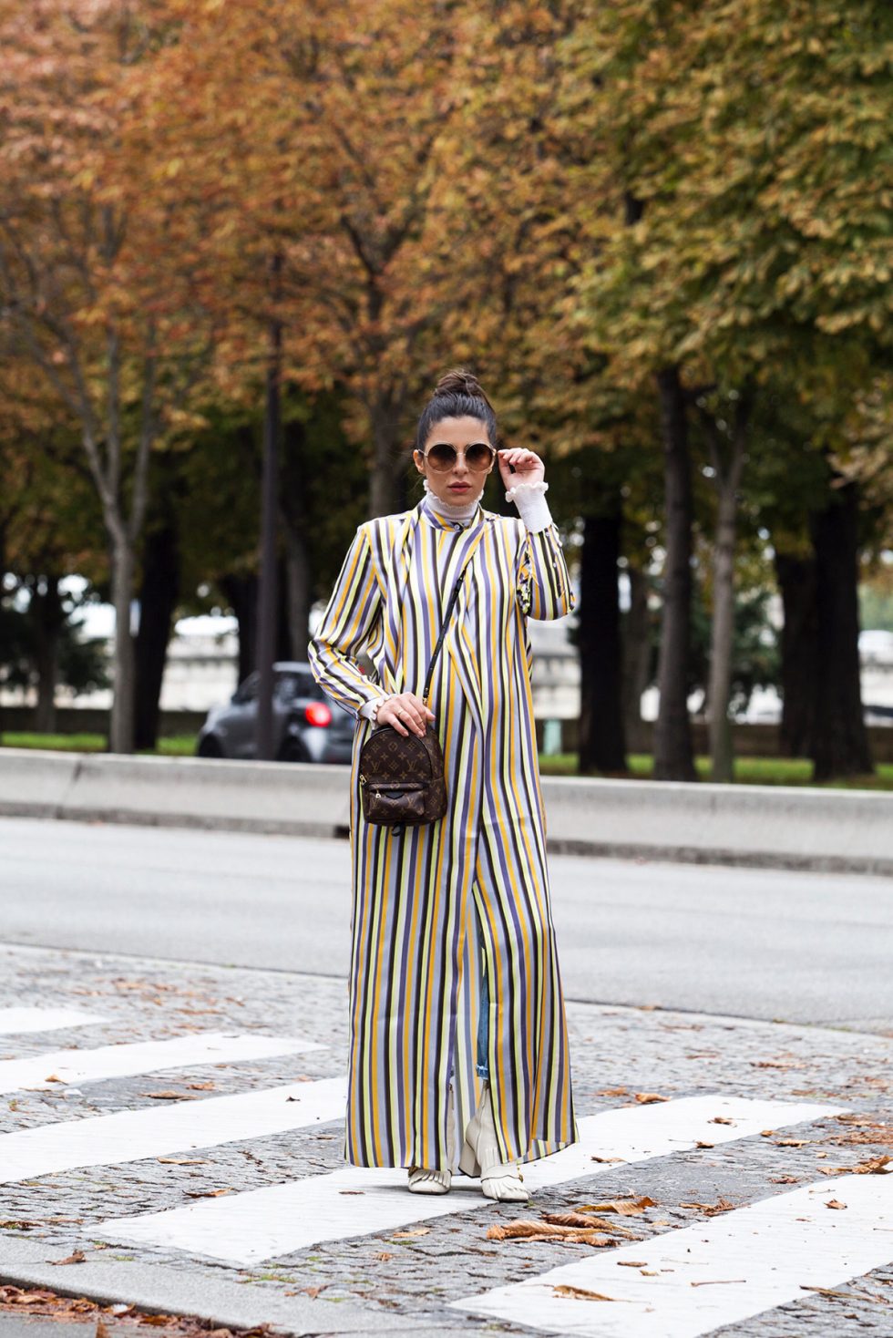 Striped Dress With Jeans & Statement Sunglasses At Paris Fashion Week