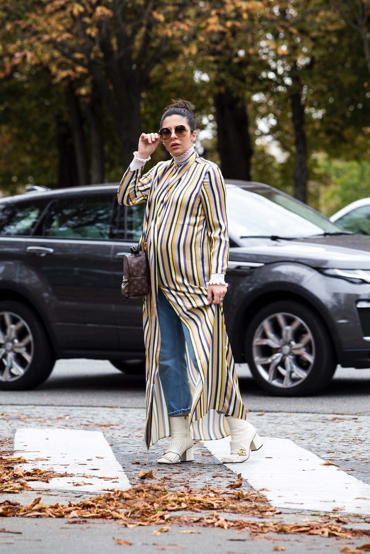 Stella Asteria wearing striped dress with jeans at Paris Fashion Week SS'18