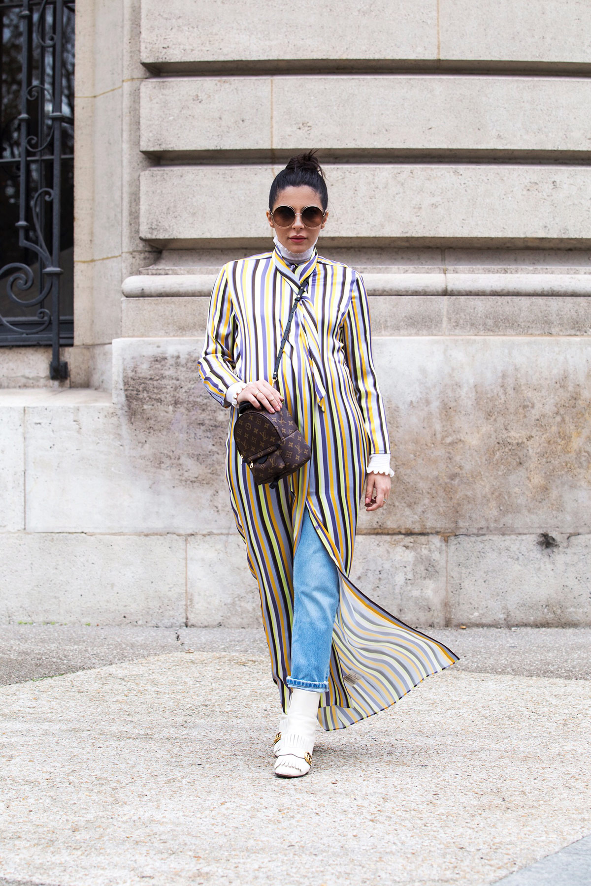 Stella Asteria wearing striped dress with jeans at Paris Fashion Week SS'18