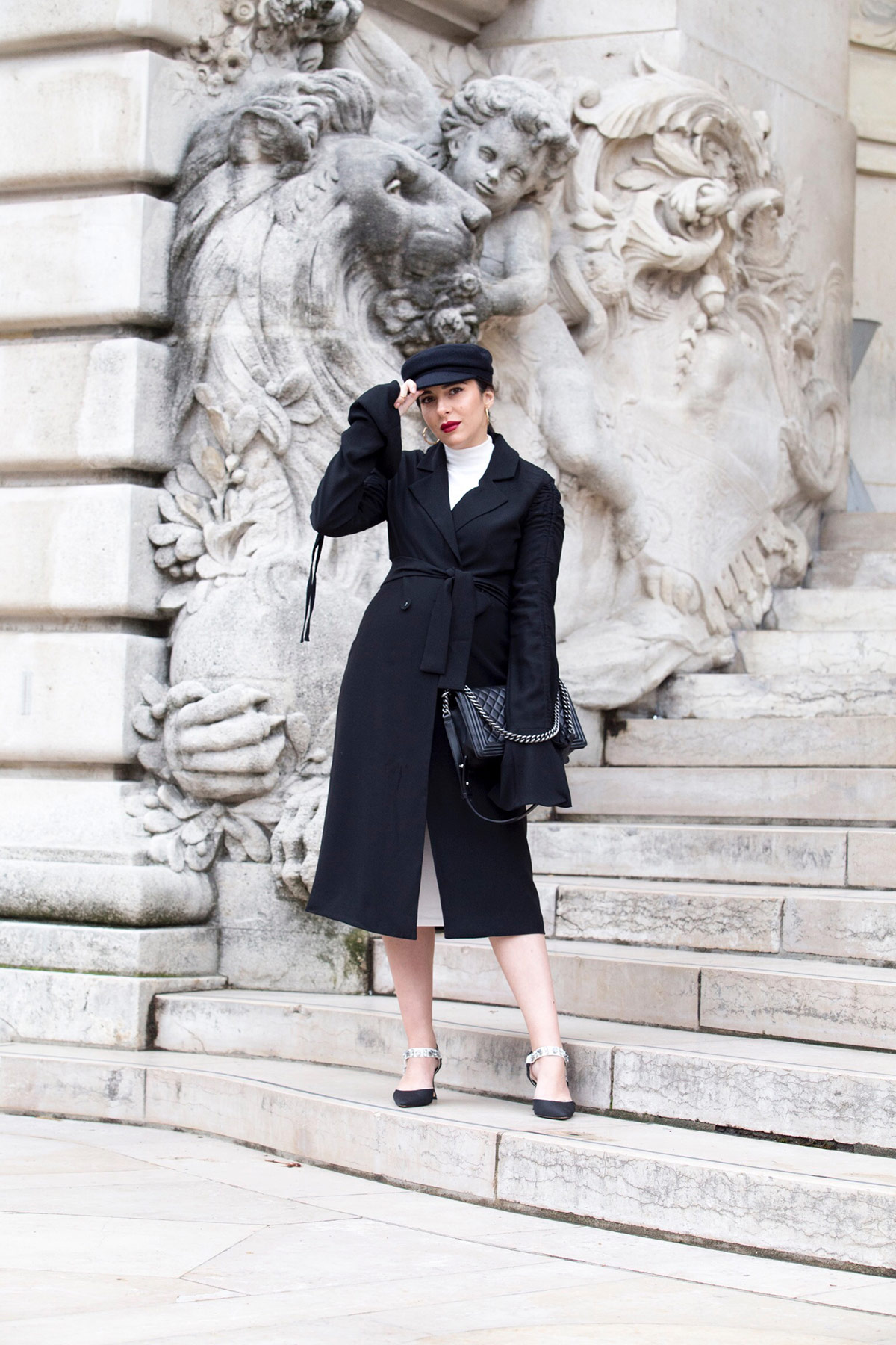 Black trench dress and baker boy hat for John Galliano Show during PFW Paris Fashion Week by Stella Asteria - Fashion & Lifestyle Blogger - Paris Fashion Week Street Style - Chanel boy bag, trench dress and total black look