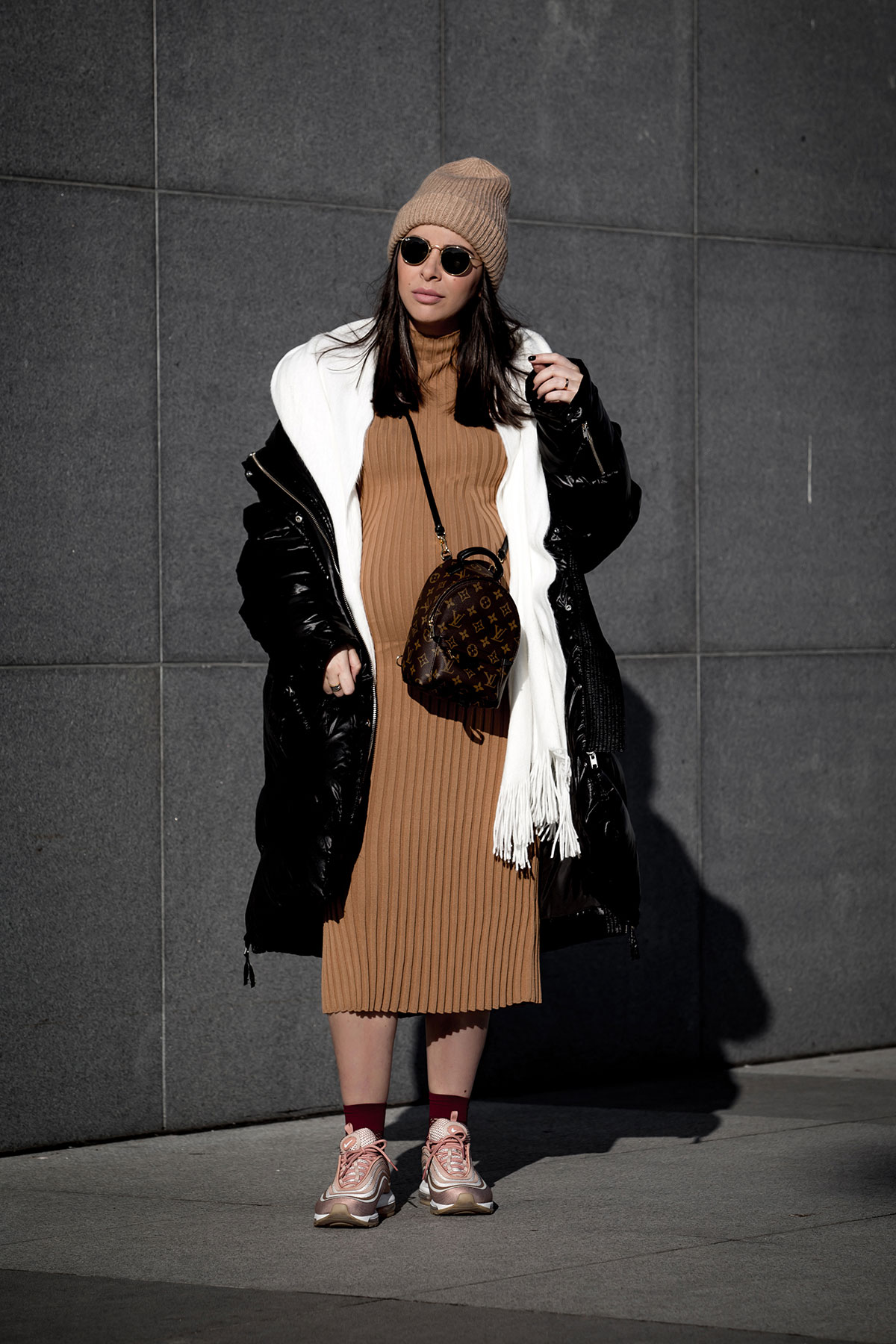 how to wear non-maternity maternity clothes by Stella Asteria | Fashion & Lifestyle Blogger - Stella Asteria wearing maternity style with puffer coat, bodycon dress, beanie hat, Nike sneakers and Louis Vuitton Palm Springs Backpack