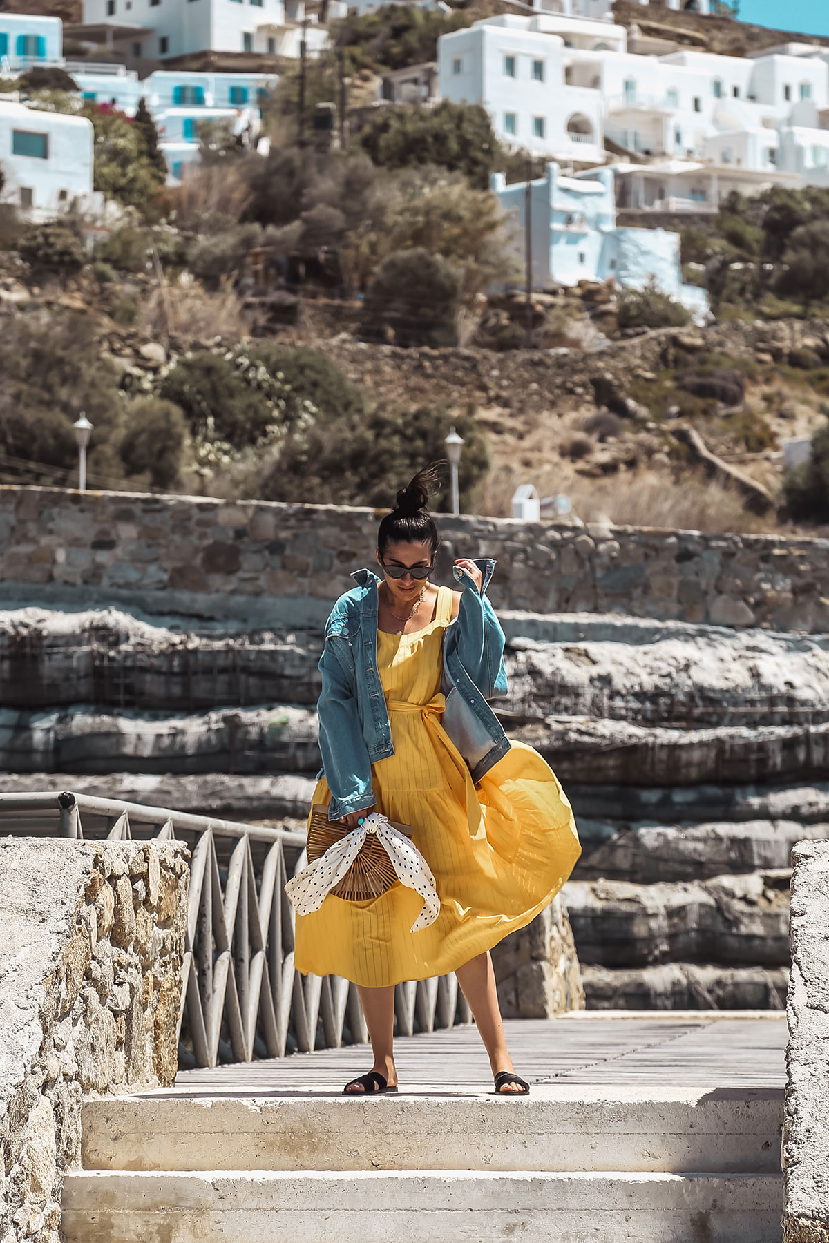 yellow dress and denim jacket in Mykonos - Michael Kors Dress worn by Stella Asteria - Fashion & Lifestyle Blogger