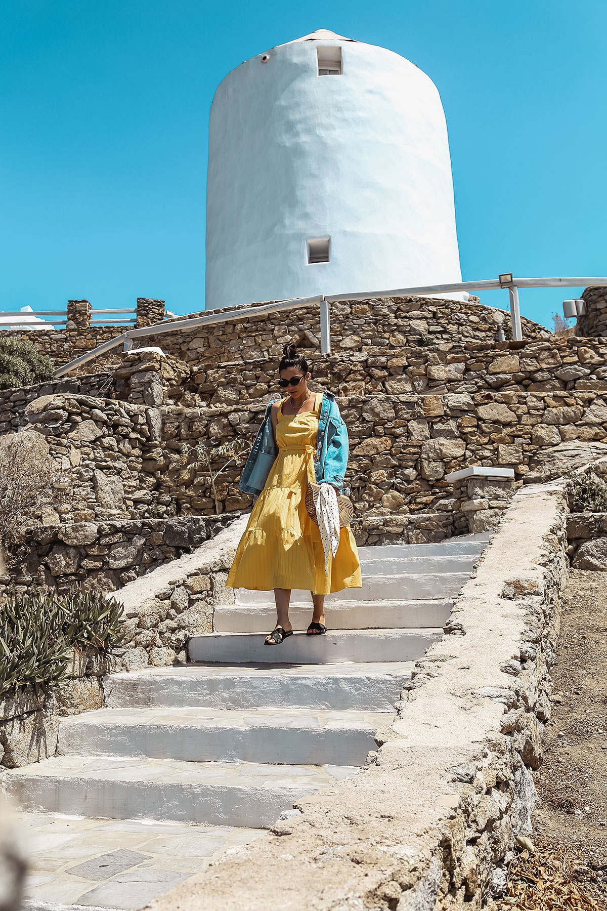yellow dress and denim jacket in Mykonos - Michael Kors Dress worn by Stella Asteria - Fashion & Lifestyle Blogger