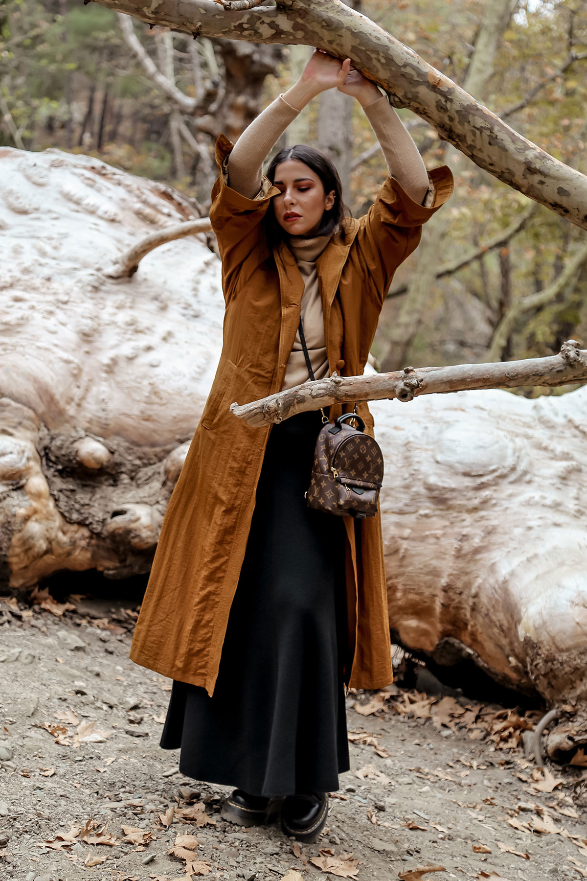 Trench coat and other favourite fall wardrobe staples by Stella Asteria - wearing turtleneck sweater with knit skirt and Dr Martens boots, vintage trench coat