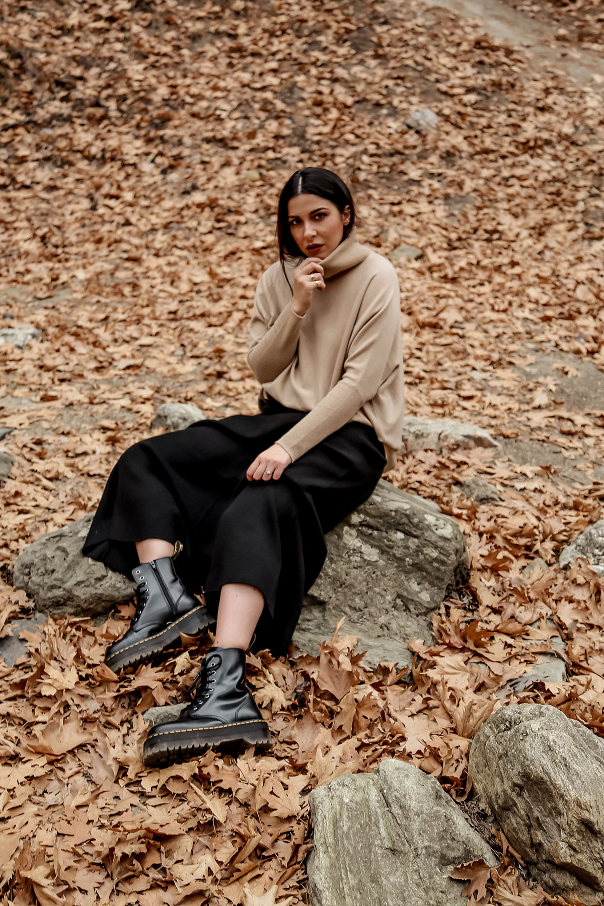fall wardrobe staples by Stella Asteria - wearing turtleneck sweater with knit skirt and Dr Martens boots
